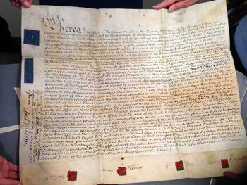 Pergamentbrevet kor Sir Hans Sloane donerar bor si gedigne private samling til kong George II mot ein kompensasjon til arvingane. Foto: Kulturhistorisk musem, UiO / Anne Britt Halvorsen