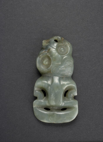 Museum number: UEM144 b
Material: Jade/semiprecious stone,&amp;#160;Hei Tiki
Region and culture: New Zealand - Maori&amp;#160;&amp;#160;
Description:&amp;#160;Pendant or&amp;#160;hei tiki. 9,4 cm. The hei tiki is a very stylised representation of the human form. Usually considered either female or genderless.&amp;#160;The splayed hips, sometimes dilated vulva, bulging eyes and hands akimbo is considered to be representations of a woman in childbirth and thus the object can also be associated with gods of fertility.&amp;#160;Made from jade (nephritt), these antropomorphic pendants are considered one of the most valuable&amp;#160;taonga&amp;#160;(treasured possesion) amongst the Maori. Jade is commonly found on the South Island of&amp;#160;Aotearoa, New Zealand, yet the hei tiki is usually associated with the North Island. Due to the valuable nature of the hei tiki, the object is usually connected with the upper class amongst Māori, giving the object&amp;#160;mana&amp;#160;(power). Though not precisley dated, the hei tiki can be traced back to the Classical Māori period (Te Puawiatanga, 1500-1800).&amp;#160;&amp;#160;&amp;#160;
The object was collected by Fredrik Ring in Valparaiso, Chile in the 1820s. Konsul Ring donated the object to the Ethnographic Museum in 1833.&amp;#160;&amp;#160;