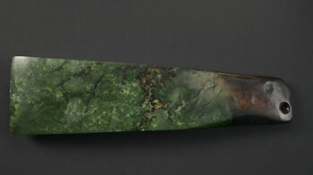Museum number: UEM158
Material: nephrite/jade
Region and culture: New Zealand - Maori&amp;#160;&amp;#160;
Description:&amp;#160;Toki pounamu&amp;#160;or nephrite adze from Hokianga, Aotearoa New Zealand. Dated to the Archaic Māori period (Te Tipunga&amp;#160;1200-1500). The blade is finely ground with a sharp cutting edge. The adze was attached to a wooden shaft held together by braided fibres. The technology for producing adzes was brought to New Zealand by Māori ancestors, and the first items made from nephrite or pounamu to appear in the archaeological record were adzes.&amp;#160; Objects made from nephrite were highly valued by the Māori. Pounamu was a very rare stone type, found only on the South Island of Aotearoa New Zealand, making the material highly sought after, especially on the North Island. Objects like the&amp;#160;Toki pounamu&amp;#160;was probably inherited through generations. It may have also been given as a gift to other tribes (iwis), to be returned at a later point.&amp;#160;&amp;#160;
