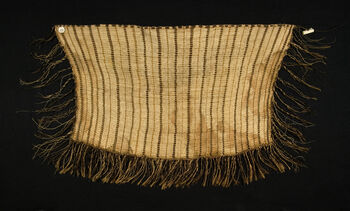 Museum number: UEM182
Material: Bone, unknown fibre
Region and culture: New Zealand - Maori&amp;#160;
Description:&amp;#160;Māori shoulder or hip shawl (kakahu). Could possibly be dated to the post-classic Māori period (Te Huringa 1800 - present). The shawl derives from Hokianga, Aotearoa New Zealand. It was woved by using New Zealand flax fiber (Harakeke). This shawl probably belongs to the type kaitaka, and is considered to be one of the most prestigious of the traditional Maori garments. These shawls were, and still is, given as prestigious gifts for individuals and families, to cement meaningful and important relationships and events. This shawls relatively simple vertical pattern (taniko) could indicate a derival from the early 19th century. These patterns could symbolise different stories with different interpretations, based upon region an tribal (iwi) affility.&amp;#160;&amp;#160;