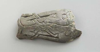 Et fragment av en fugleformet spenne fra 700-tallet. Funnet på Sem tidligere.